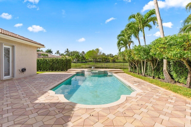 8837 Woodgrove Ridge Ct, Boynton Beach, FL 33473 - view of swimming pool with a pool with connected hot tub, a fenced backyard, and a patio area