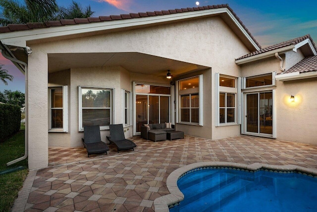 8837 Woodgrove Ridge Ct, Boynton Beach, FL 33473 - rear view of property with stucco siding, an outdoor pool, a patio area, a ceiling fan, and a tiled roof