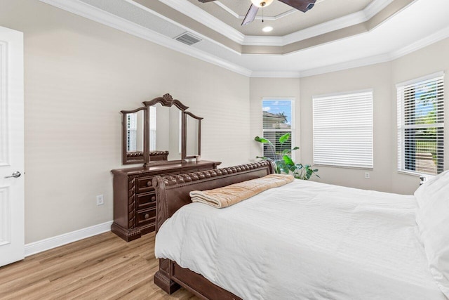 8837 Woodgrove Ridge Ct, Boynton Beach, FL 33473 - bedroom with a raised ceiling, ornamental molding, baseboards, and light wood-type flooring