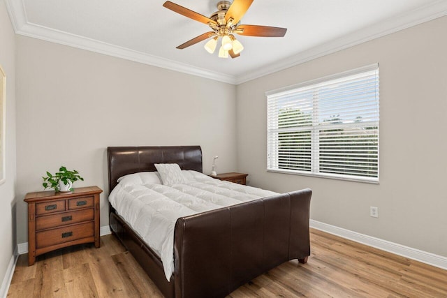 8837 Woodgrove Ridge Ct, Boynton Beach, FL 33473 - bedroom with crown molding, a ceiling fan, light wood finished floors, and baseboards