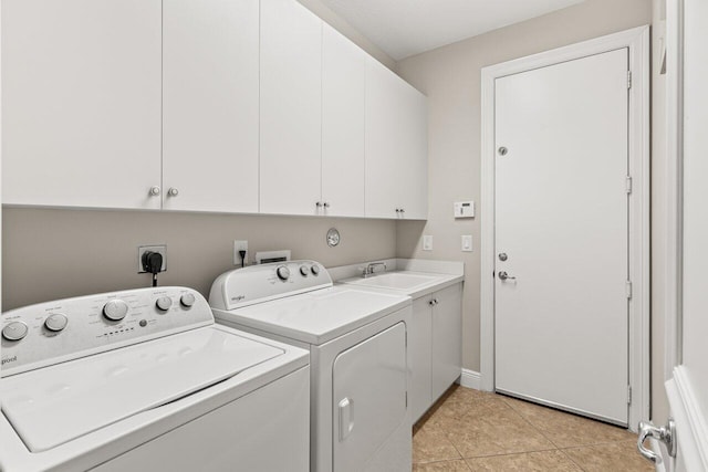 8837 Woodgrove Ridge Ct, Boynton Beach, FL 33473 - washroom featuring separate washer and dryer, a sink, cabinet space, and light tile patterned flooring