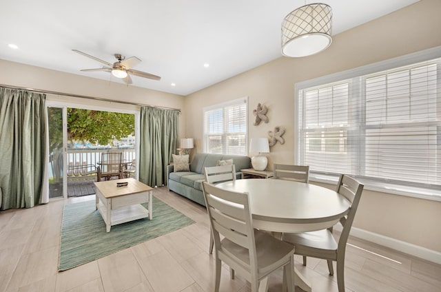 dining area featuring baseboards, a ceiling fan, and recessed lighting
