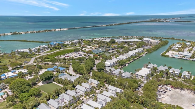 aerial view featuring a water view and a residential view