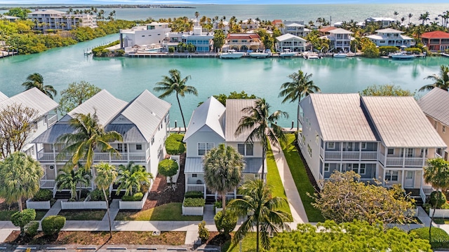 aerial view featuring a water view and a residential view