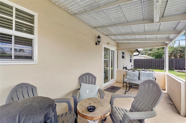 view of patio featuring fence