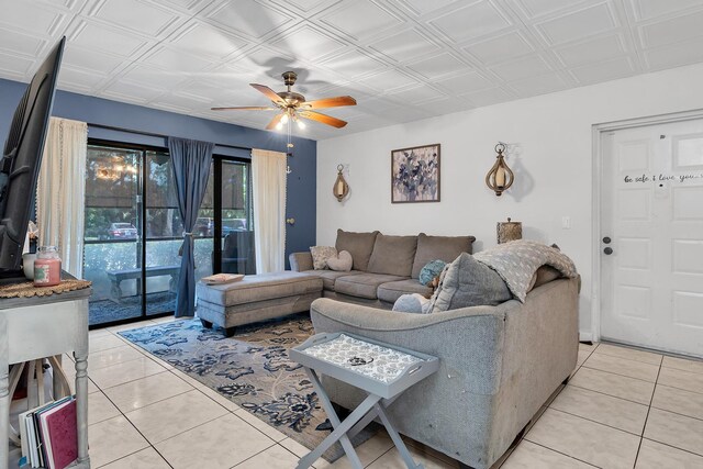 712 Sunny Pine Way Unit D1, Greenacres, FL 33415 - living area featuring an ornate ceiling, ceiling fan, and light tile patterned floors