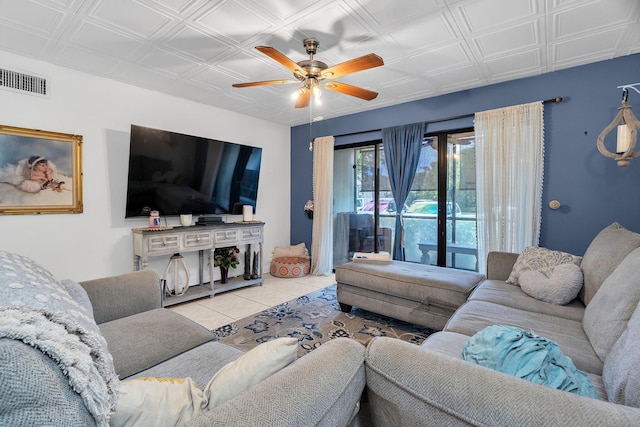 712 Sunny Pine Way Unit D1, Greenacres, FL 33415 - living area featuring visible vents, a ceiling fan, tile patterned floors, and an ornate ceiling