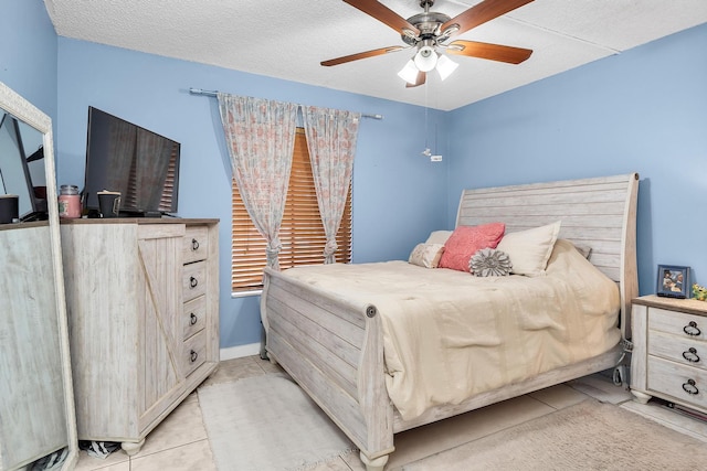 712 Sunny Pine Way Unit D1, Greenacres, FL 33415 - bedroom with light tile patterned floors and a ceiling fan