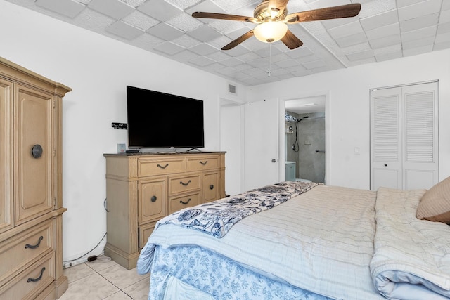 712 Sunny Pine Way Unit D1, Greenacres, FL 33415 - bedroom with visible vents, a closet, ensuite bath, a ceiling fan, and light tile patterned floors