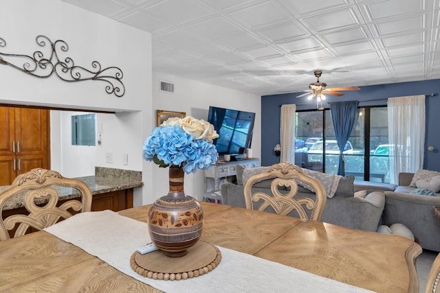 712 Sunny Pine Way Unit D1, Greenacres, FL 33415 - dining area featuring an ornate ceiling, ceiling fan, and visible vents