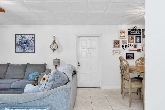 712 Sunny Pine Way Unit D1, Greenacres, FL 33415 - living area featuring an ornate ceiling, baseboards, and light tile patterned floors
