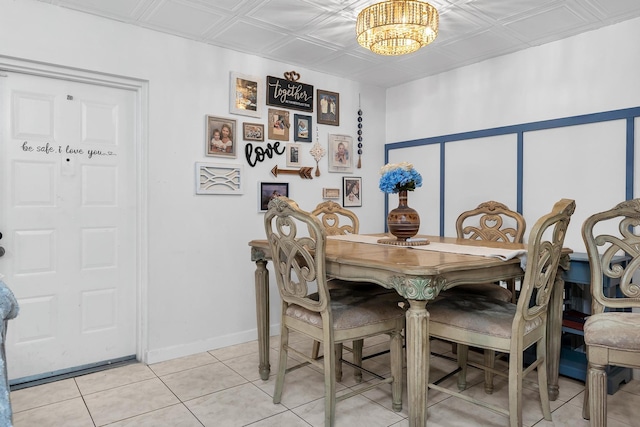 712 Sunny Pine Way Unit D1, Greenacres, FL 33415 - dining area with baseboards, light tile patterned floors, an ornate ceiling, and a chandelier