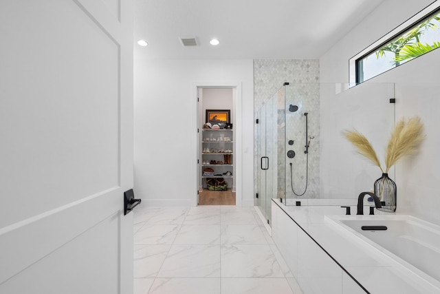 13158 Artisan Cir, Palm Beach Gardens, FL 33418 - bathroom with a shower stall, a spacious closet, marble look tile flooring, and recessed lighting