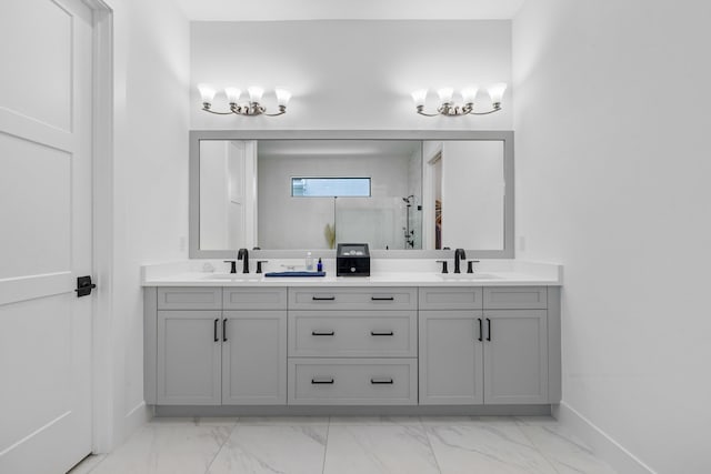 13158 Artisan Cir, Palm Beach Gardens, FL 33418 - full bathroom featuring a shower stall, double vanity, marble look tiles, and baseboards