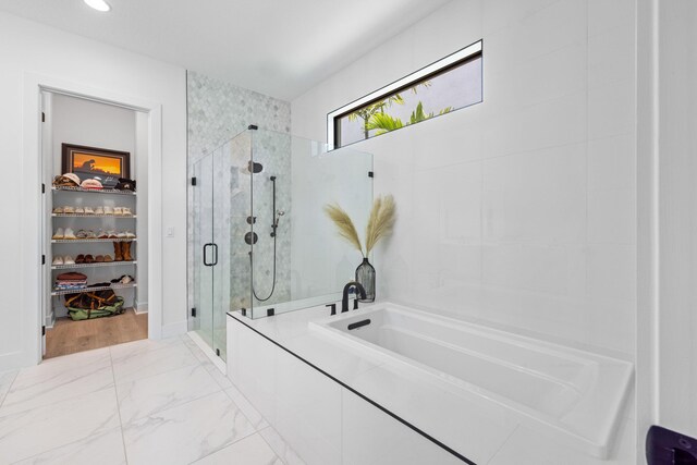 13158 Artisan Cir, Palm Beach Gardens, FL 33418 - bathroom with a shower stall, a bath, and a spacious closet
