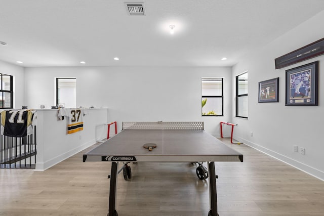13158 Artisan Cir, Palm Beach Gardens, FL 33418 - playroom with plenty of natural light, light wood finished floors, and recessed lighting