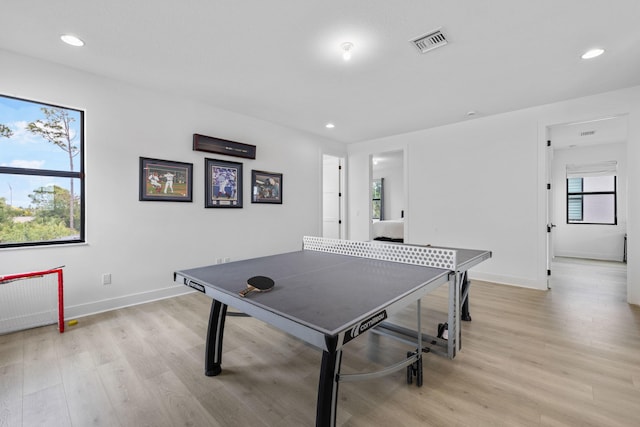 13158 Artisan Cir, Palm Beach Gardens, FL 33418 - game room featuring light wood-type flooring and recessed lighting