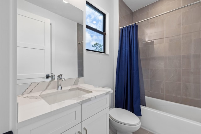 13158 Artisan Cir, Palm Beach Gardens, FL 33418 - bathroom featuring vanity, toilet, and shower / bath combo with shower curtain