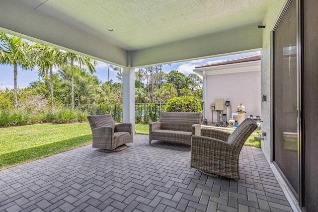 13158 Artisan Cir, Palm Beach Gardens, FL 33418 - view of patio with view of wooded area