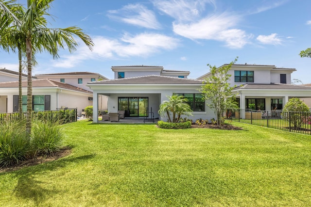 13158 Artisan Cir, Palm Beach Gardens, FL 33418 - rear view of property featuring stucco siding