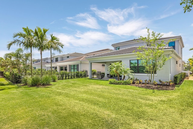 13158 Artisan Cir, Palm Beach Gardens, FL 33418 - rear view of property with stucco siding and a patio