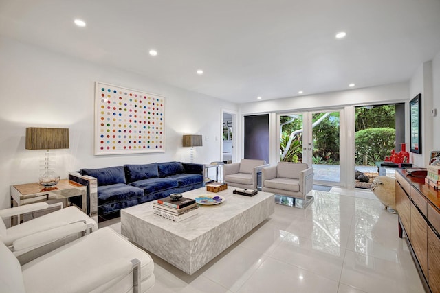 living area featuring light tile patterned floors and recessed lighting
