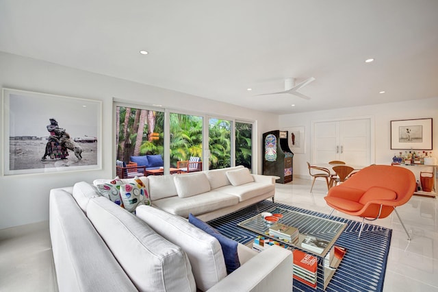 living room featuring recessed lighting, ceiling fan, and tile patterned flooring