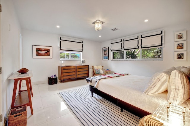 tiled bedroom with recessed lighting, baseboards, and visible vents
