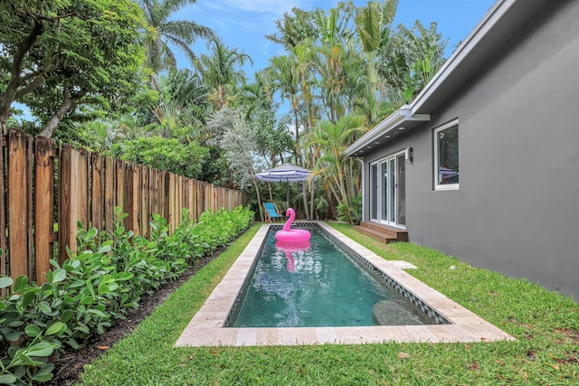 view of pool featuring a fenced backyard and a fenced in pool