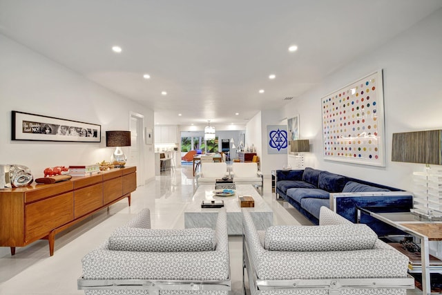 living room with recessed lighting and visible vents