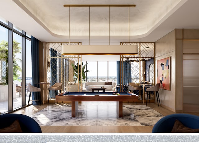 383 Okeechobee Blvd Unit 1602, West Palm Beach, FL 33401 - playroom featuring expansive windows, pool table, and a tray ceiling