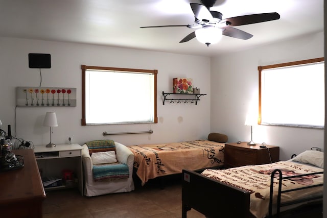 1020 NW 74th Ave, Margate, FL 33063 - tiled bedroom with ceiling fan and multiple windows