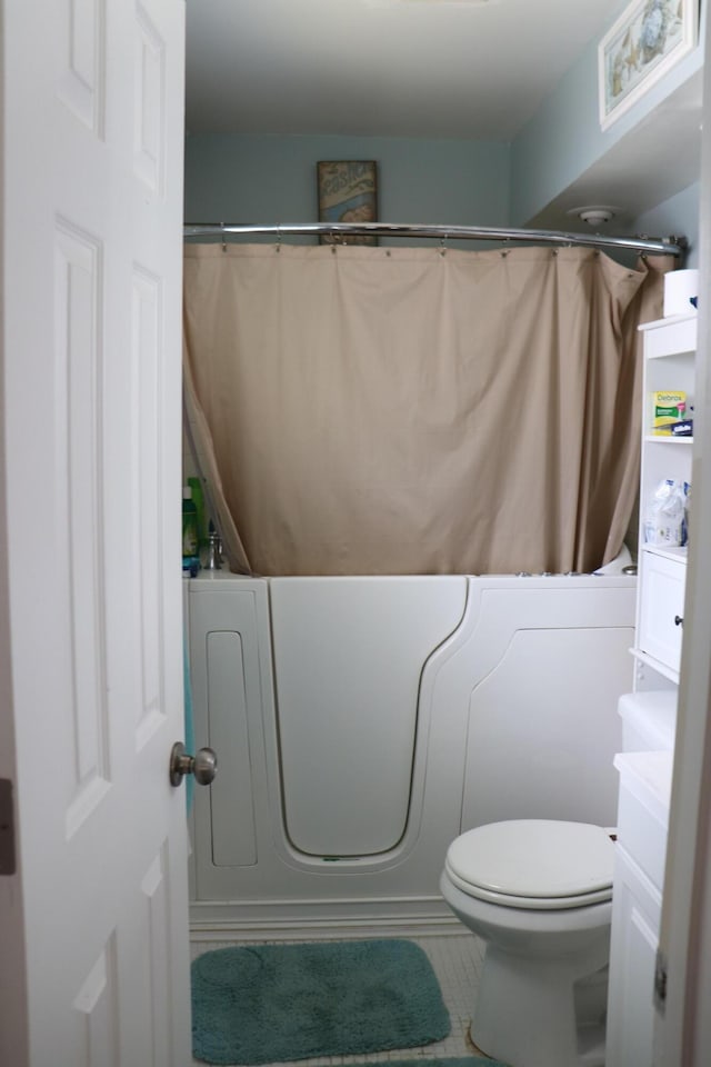1020 NW 74th Ave, Margate, FL 33063 - bathroom with tile patterned floors and toilet