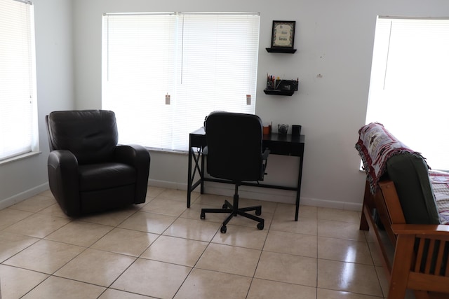 1020 NW 74th Ave, Margate, FL 33063 - office area featuring light tile patterned floors, baseboards, and a wealth of natural light
