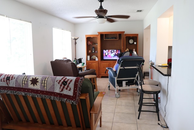 1020 NW 74th Ave, Margate, FL 33063 - living area with ceiling fan, light tile patterned flooring, and visible vents