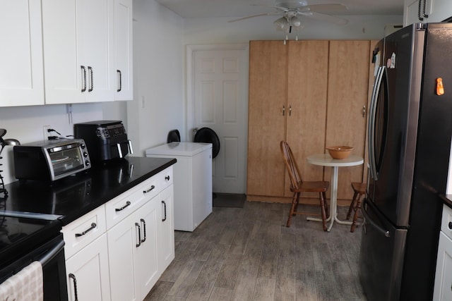 1020 NW 74th Ave, Margate, FL 33063 - kitchen with freestanding refrigerator, a ceiling fan, white cabinetry, and wood finished floors