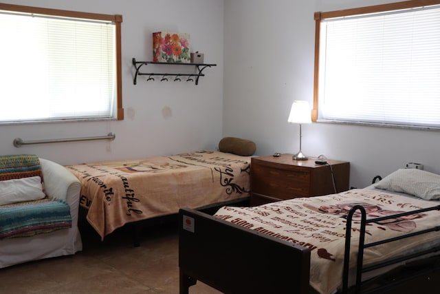 1020 NW 74th Ave, Margate, FL 33063 - tiled bedroom featuring multiple windows