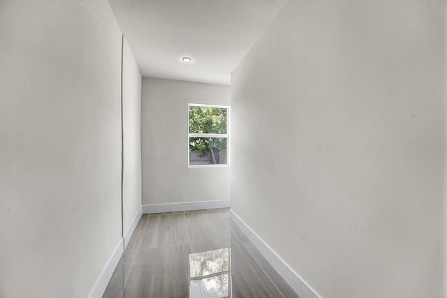 928 Market St, West Palm Beach, FL 33401 - hallway with baseboards and wood finished floors