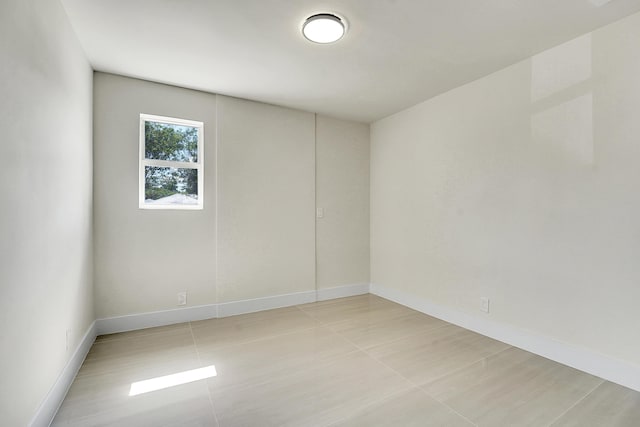 928 Market St, West Palm Beach, FL 33401 - spare room featuring baseboards