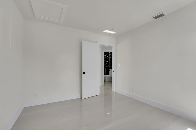 928 Market St, West Palm Beach, FL 33401 - empty room featuring baseboards, light tile patterned flooring, and visible vents
