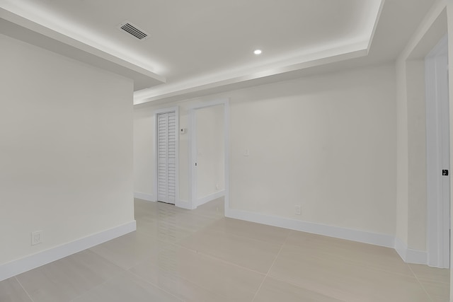 928 Market St, West Palm Beach, FL 33401 - unfurnished room with light tile patterned flooring, baseboards, visible vents, and recessed lighting