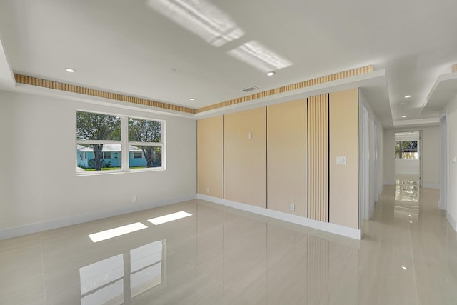 928 Market St, West Palm Beach, FL 33401 - unfurnished bedroom with recessed lighting, baseboards, and light tile patterned floors