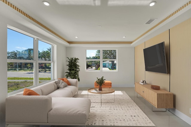 928 Market St, West Palm Beach, FL 33401 - living room with a healthy amount of sunlight, baseboards, light tile patterned floors, and visible vents