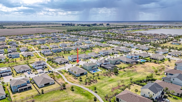 aerial view with a residential view and a water view