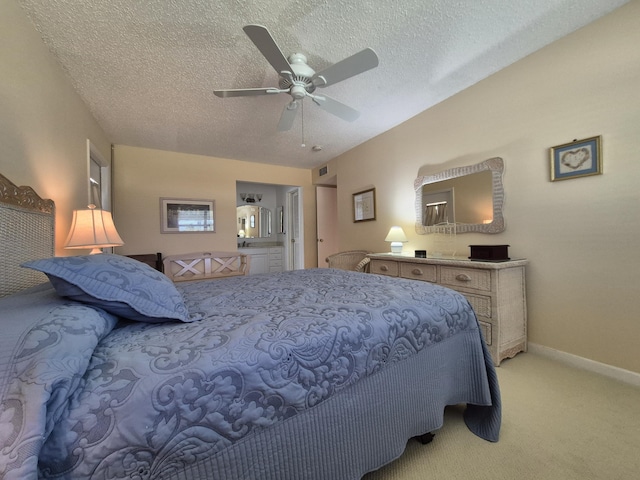 bedroom with baseboards, a textured ceiling, ceiling fan, and light carpet