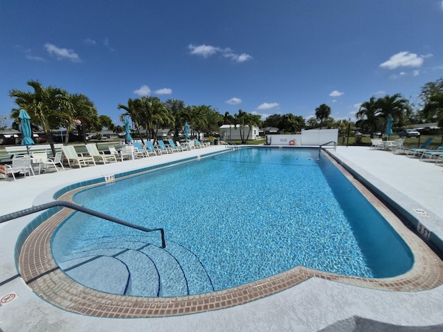 community pool featuring a patio