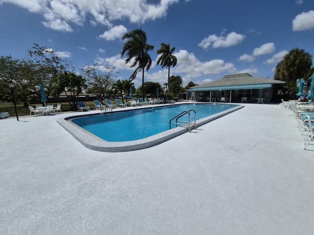 pool with a patio area