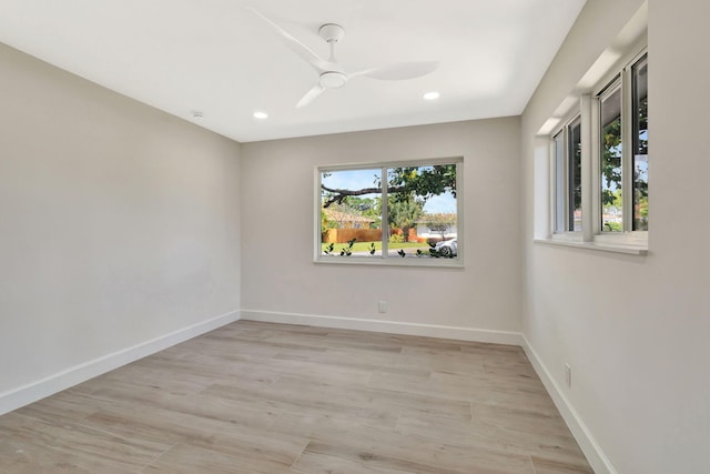 2410 SW 1st St, Boynton Beach, FL 33435 - spare room with a ceiling fan, baseboards, recessed lighting, and light wood-style floors