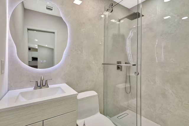 2410 SW 1st St, Boynton Beach, FL 33435 - full bath with a stall shower, visible vents, vanity, and toilet