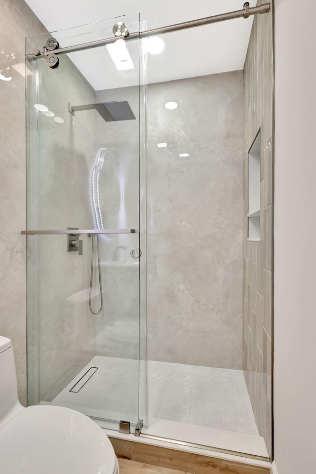 2410 SW 1st St, Boynton Beach, FL 33435 - bathroom featuring toilet and a shower stall
